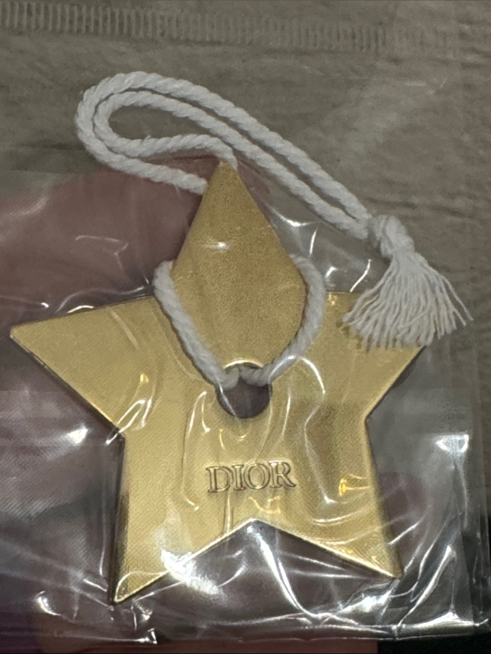 Dior Metallic Gold Star Ornament with White Tassel